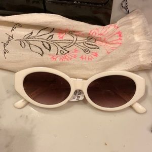 Free people sunnies with pouch! Unworn with tag attached still